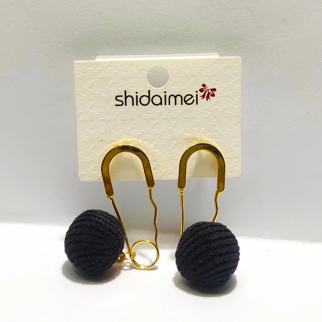 Golden Arch Black Knit Ball Earrings